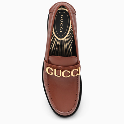 Shop Gucci Loafers With Gold Logo In Brown