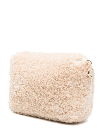 Shop Ash Felia Fake Fur Crossbody Bag In White