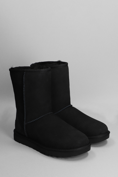 Shop Ugg Classic Short Ii Low Heels Ankle Boots In Black Suede