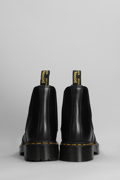 Shop Dr. Martens' 2976 Bex Combat Boots In Black Leather