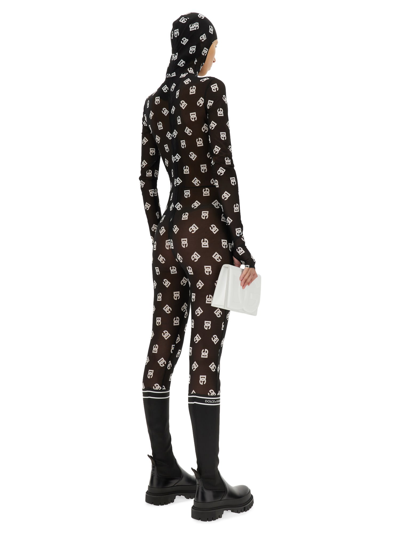 Dolce & Gabbana Marquisette Jumpsuit With Hood And Logo Print In Nero