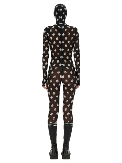 Dolce & Gabbana Marquisette Jumpsuit With Hood And Logo Print In Nero
