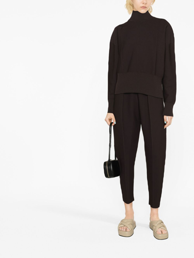 Shop Issey Miyake Tapered Cropped Knitted Trousers In Brown
