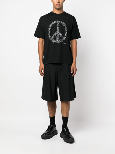 Shop Undercover Peace-logo Print T-shirt In Black