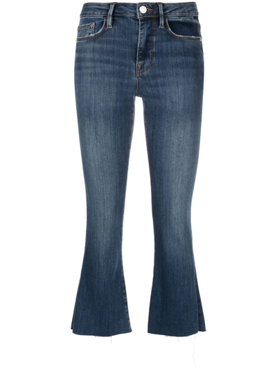 Shop Frame Low-rise Cropped Bootcut Jeans In Blue