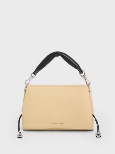 Shop Charles & Keith Nina Leather Padded Handle Bag In Beige