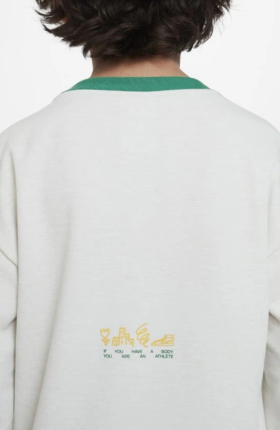 Shop Nike Kids' Dri-fit Crewneck Sweatshirt In Bone/ Malachite/ Yellow