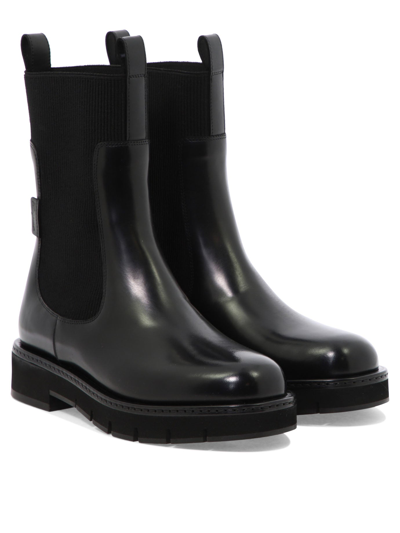 Shop Ferragamo "rook" Ankle Boots In Black  