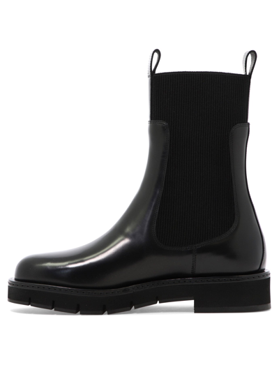 Shop Ferragamo "rook" Ankle Boots In Black  