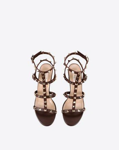 Shop Valentino Rockstud Sandal In Dark Brown