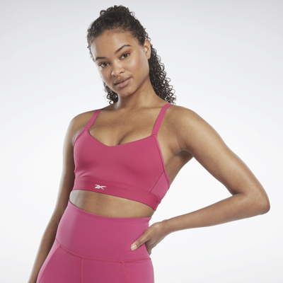 Shop Reebok Women's Lux Strappy Sports Bra In Semi Proud Pink