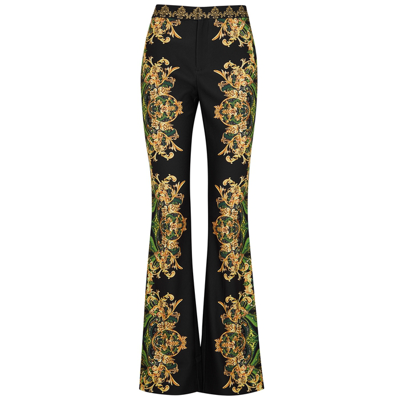Shop Alice And Olivia Olivia Printed Flared-leg Trousers In Black