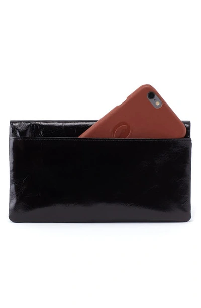 Shop Hobo Lumen Zip Bifold Wallet In Black