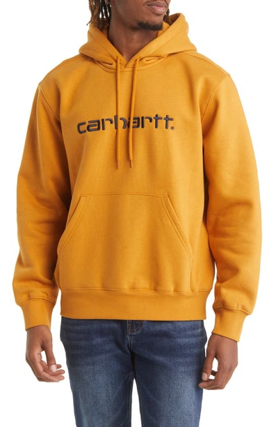 Shop Carhartt Hooded Logo Sweatshirt In Ochre / Dark Navy