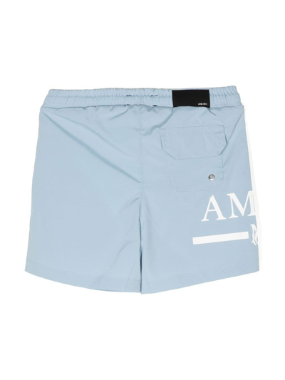 Shop Amiri Logo-print Swim Shorts In 蓝色