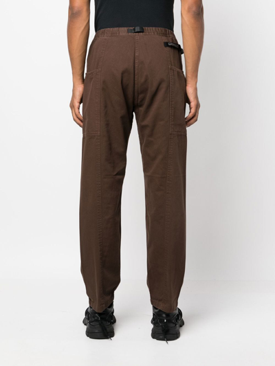 Shop Gramicci Belted Straight-leg Trousers In 褐色