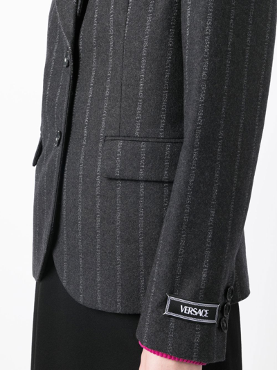 Versace Ges Logo-pinstripe Blazer In Black