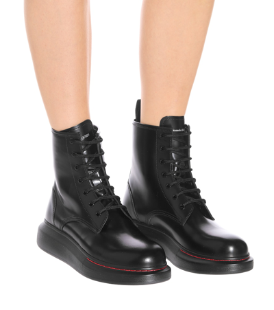 Shop Alexander Mcqueen Leather Ankle Boots In Black