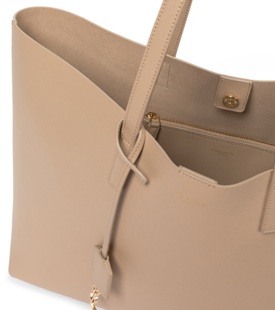 Shop Saint Laurent Shopping E/w Leather Tote In Beige