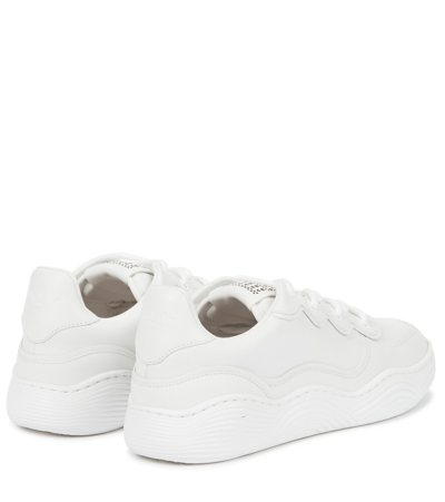Shop Alaïa Laser-cut Leather Sneakers In White