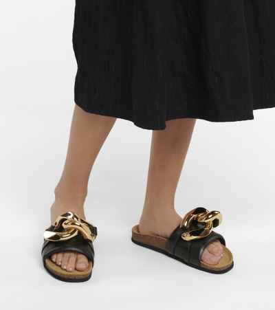 Jw Anderson Embellished Leather Slides In Black