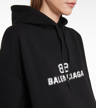 Shop Balenciaga Logo Cotton Hoodie In 黑色