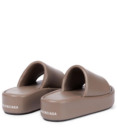 Shop Balenciaga Rise Leather Platform Slides In 米色