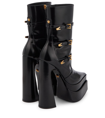 Shop Versace Aevitas Pointy Leather Ankle Boots In Nero-oro