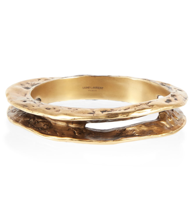 Shop Saint Laurent Textured Bangle In Aged Gold