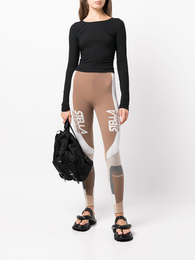 Shop Alo Yoga Gathered Cropped Long-sleeve Top In Black