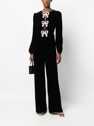 Shop Saloni Bow-detail Velvet Effect Jumpsuit In Black