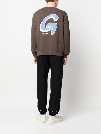 Shop Gramicci Logo-print Cotton Sweatshirt In Brown