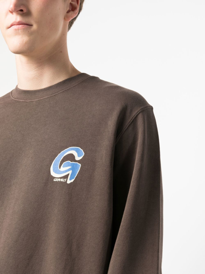 Shop Gramicci Logo-print Cotton Sweatshirt In Brown