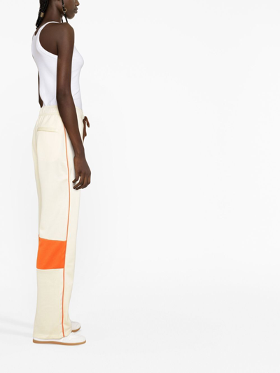 Wales Bonner Percussion Brand-embroidered Recycled-polyester Jogging Bottoms In Yellow