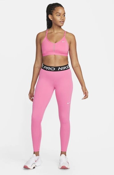 Shop Nike Pro Mid Rise Leggings In Pinksicle/ Black/ White