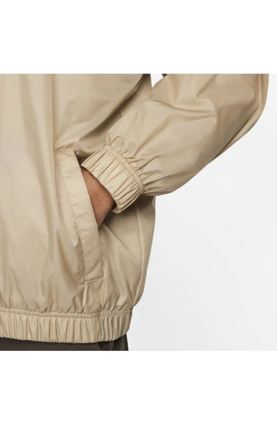 Shop Nike Water Repellent Half Zip Pullover In Khaki/ White