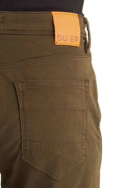 Shop Duer No Sweat Slim Fit Stretch Pants In Army Green