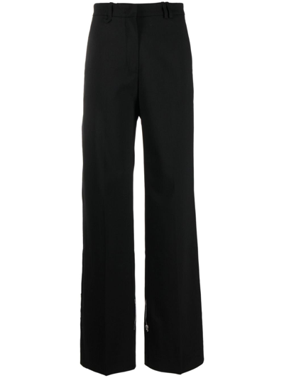 Shop Jacquemus Tapered-leg Trousers In Black