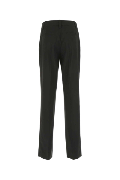 Shop Prada Logo Plaque Tailored Trousers In Black
