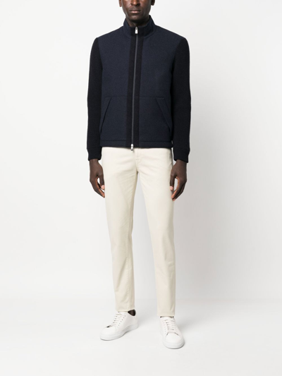 Shop Corneliani Knitted-sleeve Zipped Jacket In 蓝色
