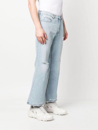 Shop Erl Distressed Flared Jeans In 蓝色
