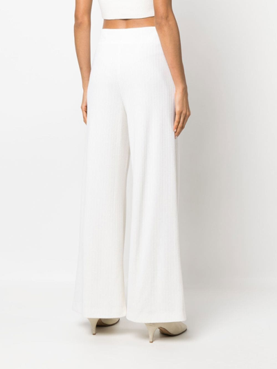 Shop Nells Nelson Wide-leg Knitted Trousers In 白色