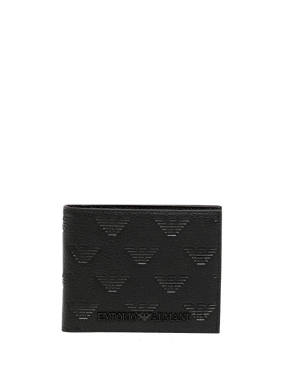 Shop Emporio Armani Debossed-logo Wallet In Black