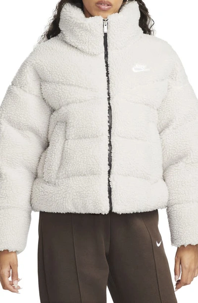 Shop Nike Sportswear Therma-fit City Series High Pile Fleece Jacket In Light Bone/ Black/ White