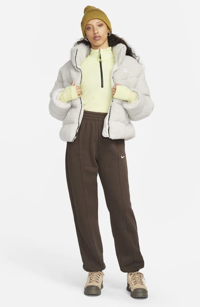 Shop Nike Sportswear Therma-fit City Series High Pile Fleece Jacket In Light Bone/ Black/ White