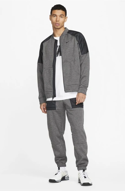 Shop Nike Therma-fit Water Repellent Full Zip Bomber Jacket In Charcoal Heather/ Black
