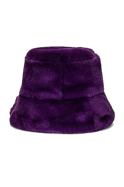 Shop Clyde Faux Fur Bucket Hat In Purple