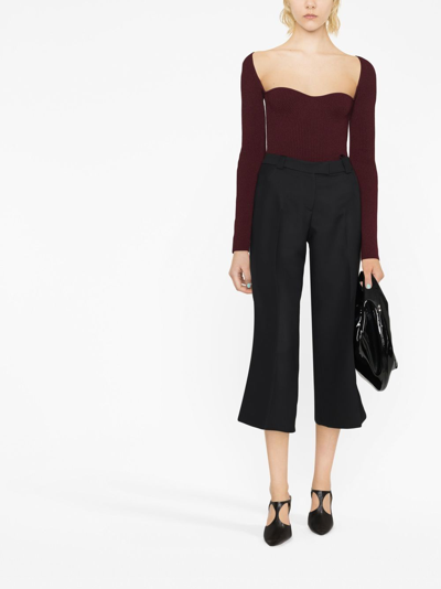 Shop Khaite Melie Cropped Tailored Trousers In Black