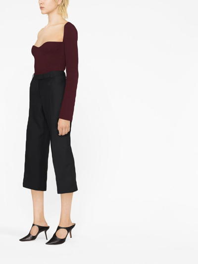 Shop Khaite Melie Cropped Tailored Trousers In Black