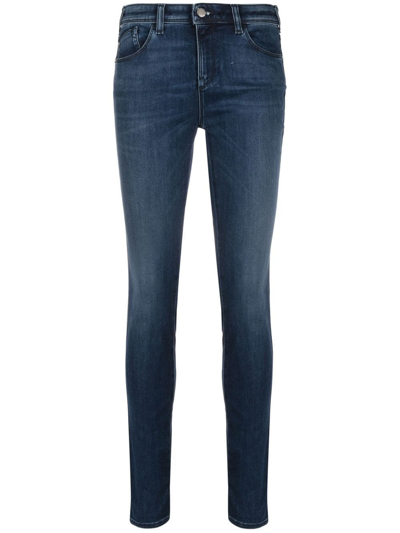 Shop Emporio Armani Skinny-cut Washed Jeans In Blue